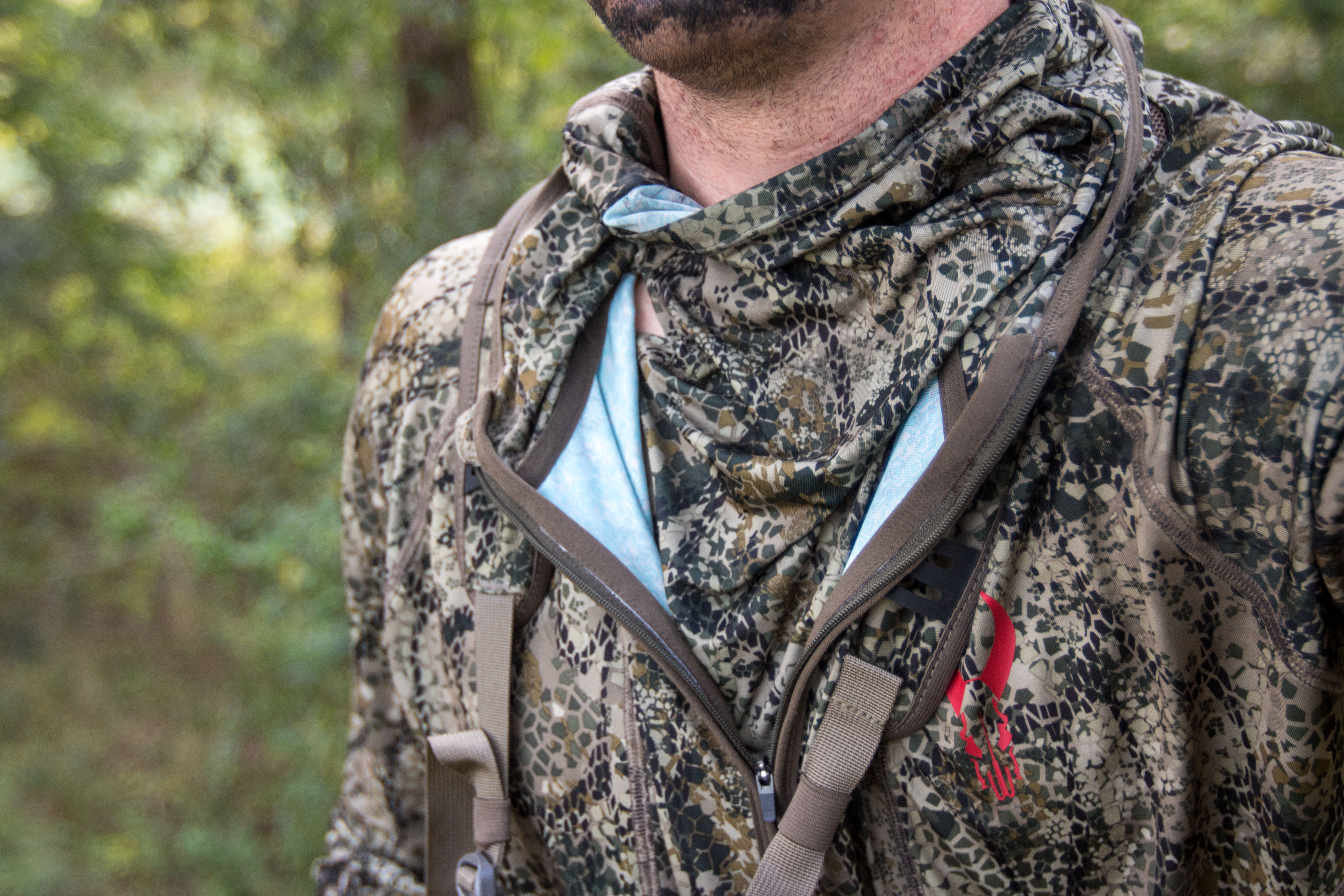 The Badlands Stealth CoolTouch hoody unzipped, exposing the integrated facemask