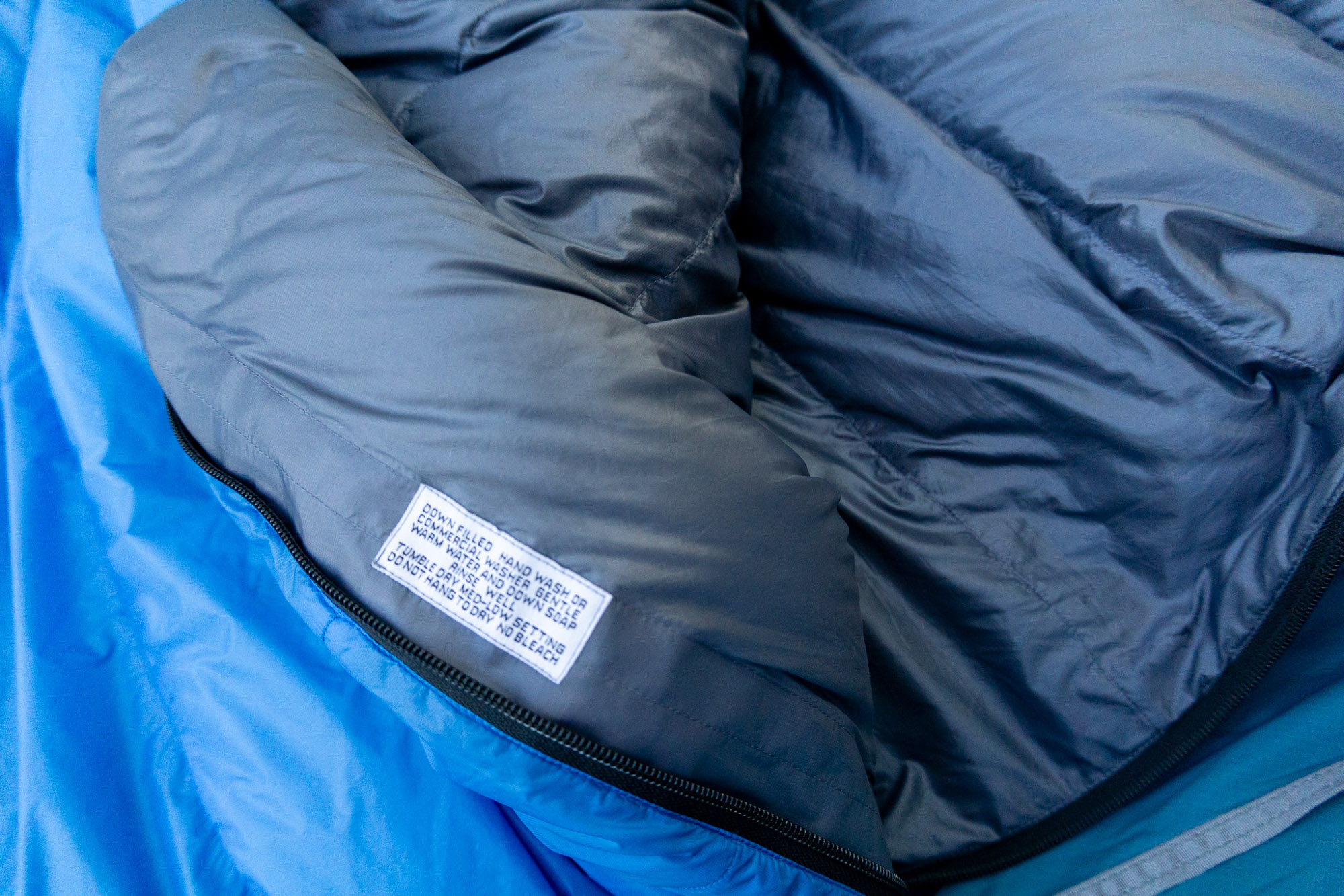 a tight image of the cleaning tag on the inside of the swallow ul sleeping bag