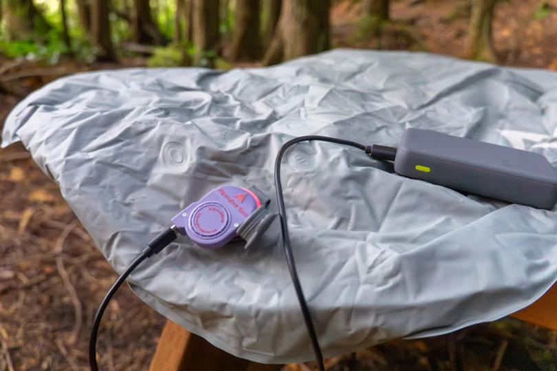the alpenglow gear pad inflator blowing up a sea to summit pad