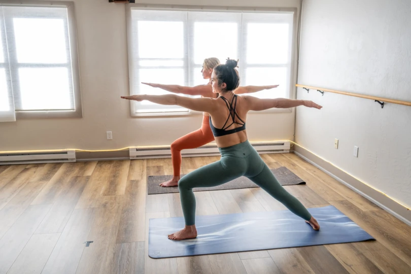 Senior Editor Morgan Tilton and yoga instructor Ashley King testing women's leggings at CB Power Yoga; (photo/Constance Mahoney)