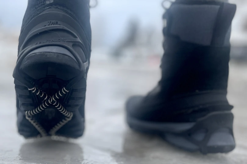 TNF Chilkat with traction devices and on ice