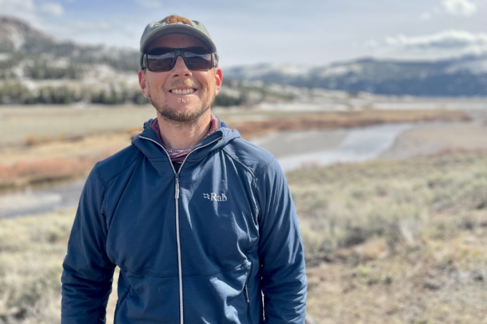 Man wearing the Rab Evolute Hoody