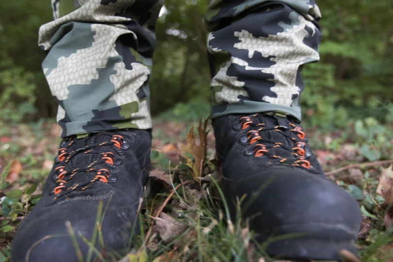 Boot hooks on the KUIU Kutana Hybrid attached to hunting boots