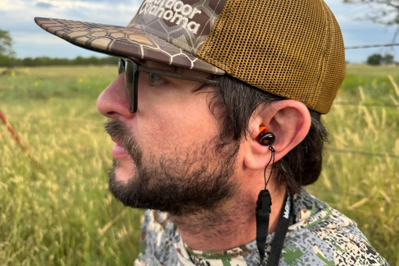 The SoundGear Shield earplug positioned firmly for clear hearing protection