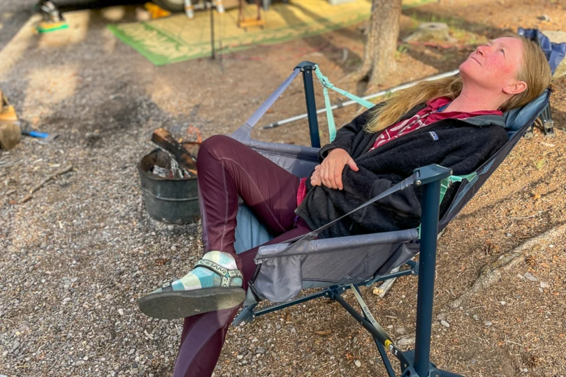 the author reclines back in the evo-x chair at a campground