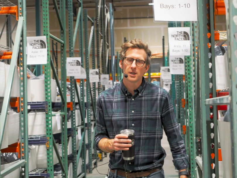 Whitcomb walks through the aisles of gear ready for resale