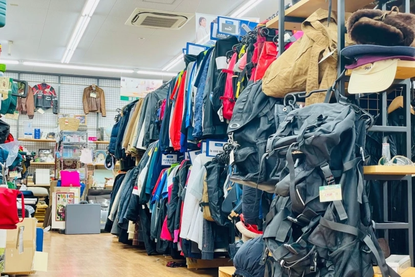 Large room full of outdoor gear