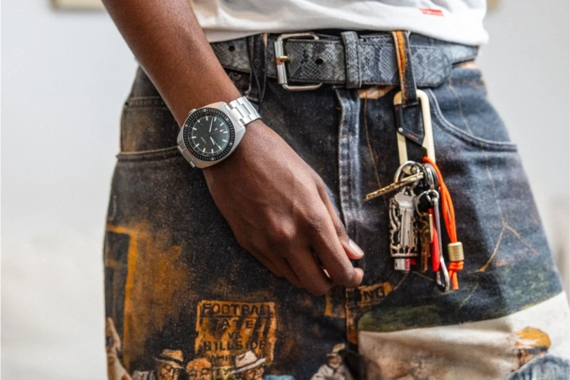 Close-up shot of person with watch on wrist