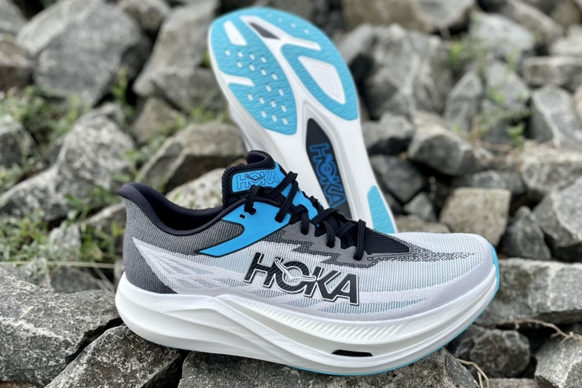 HOKA 
Rocket X 3 shoes on a rocky terrain