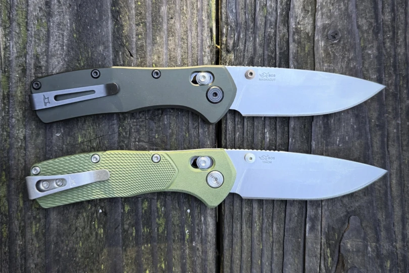 Two folding knives from the Buck Knives Range Series lying side by side on weathered wood, showing different handle textures and blade steels