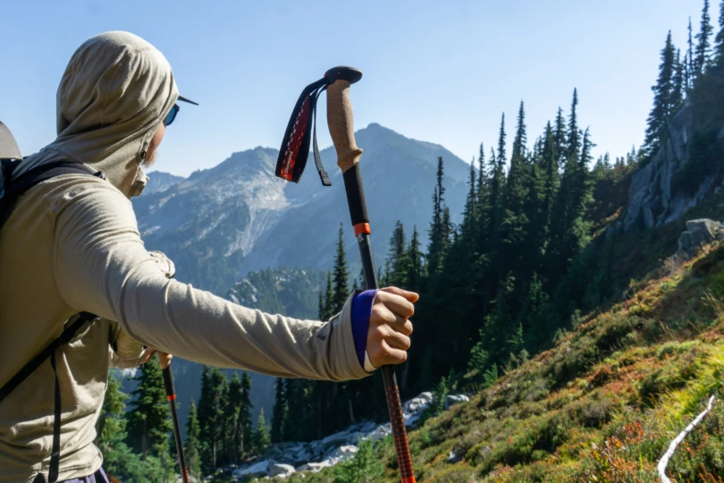 the author using a trekking pole while off trail in the north cascades