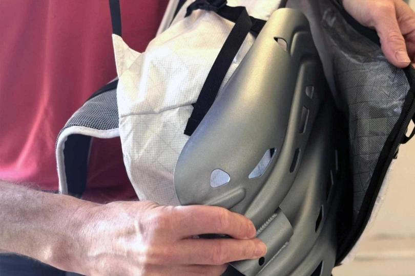 To access the shovel on the Raide Research LF 30L, swing the pack off the left shoulder and unzip the crescent zipper. This ensures the shovel is always with you when you need it; (photo/Steve Graepel)