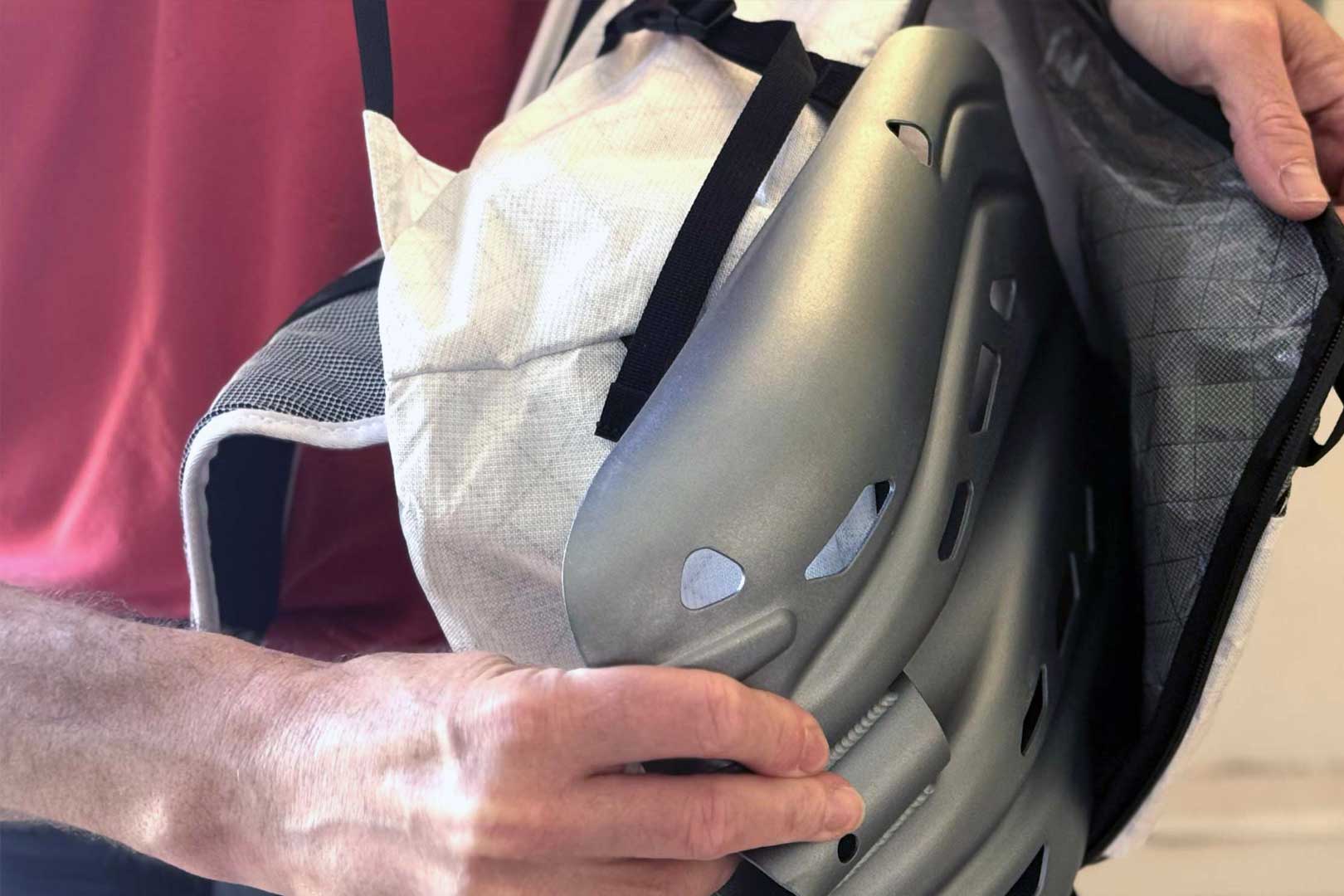 To access the shovel on the Raide Research LF 30L, swing the pack off the left shoulder and unzip the crescent zipper. This ensures the shovel is always with you when you need it; (photo/Steve Graepel)