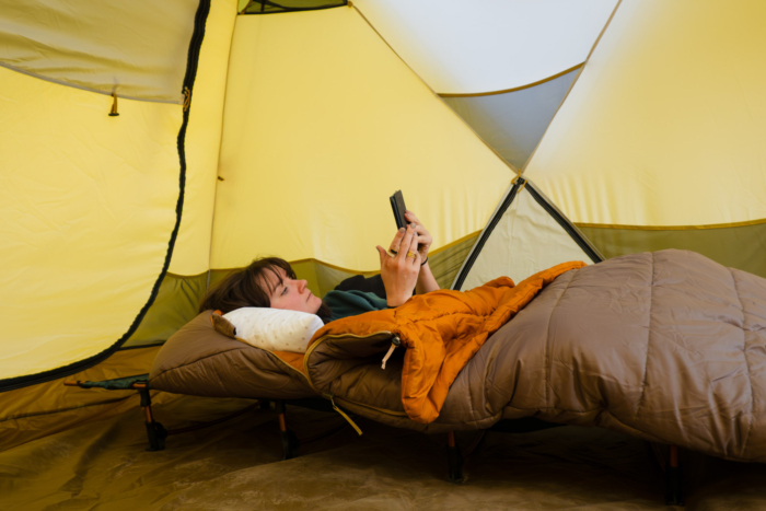 the author in the siesta sleeping bag in a tent