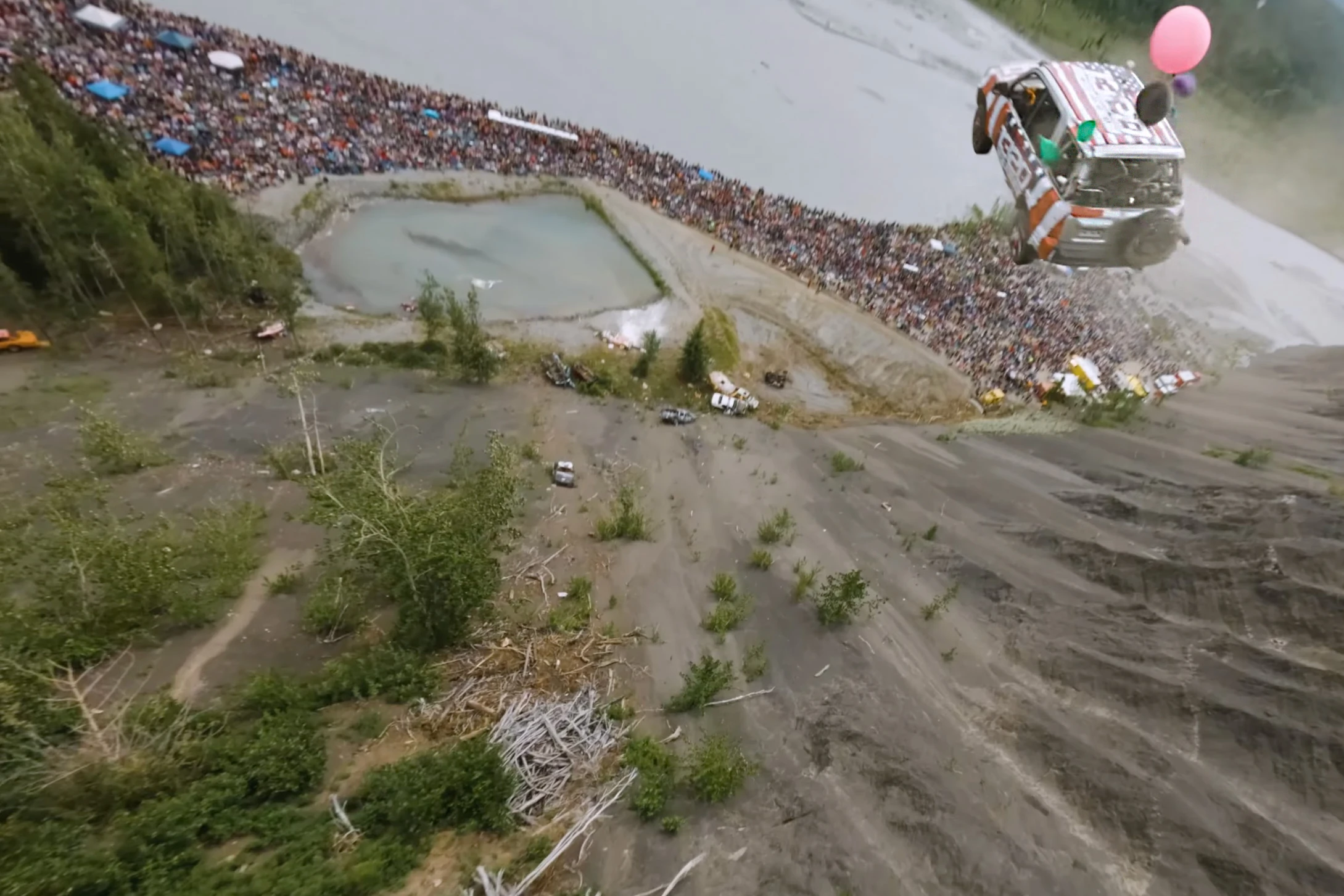 Watch Wild POV of Cars Sailing Over Cliff for Alaskan July 4th Celebration