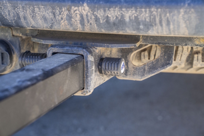 Secure hitch connection showing the 1Up anti-wobble bolt on the vehicle receiver.