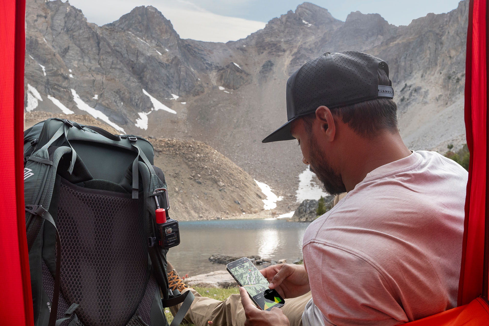 Garmin Mini 3 Plus attached to bag in wilderness