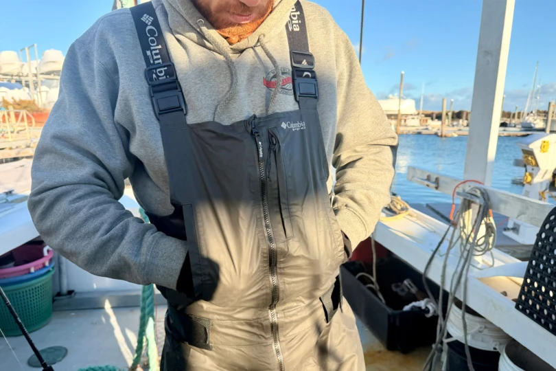 Close-up of the Columbia PFG Force XII™ ODX Bib showing the chest pocket and suspenders