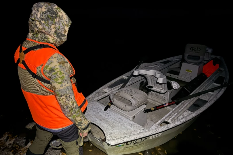 The FORLOH AllClima Soft Shell Jacket is worn near a boat in low light conditions