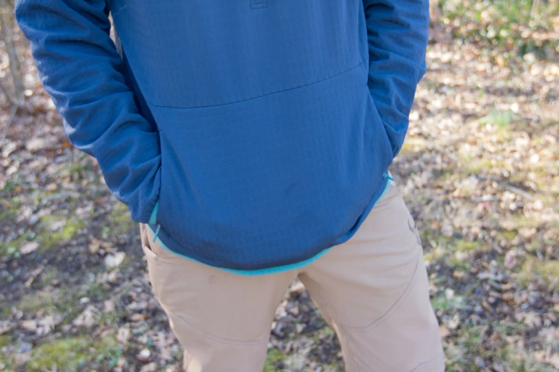 Someone holding their hands in a kangaroo style pocket.