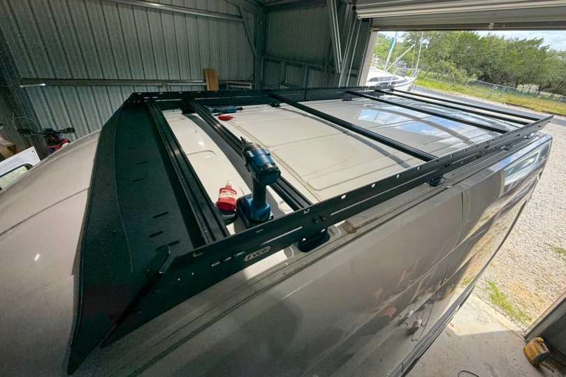 Flatline Van Co. roof rack in the installation process
