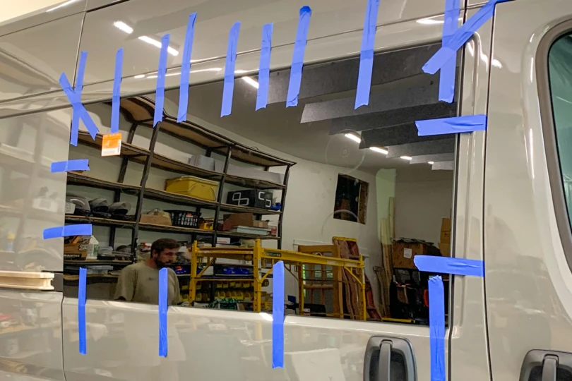 Window being installed on a campervan