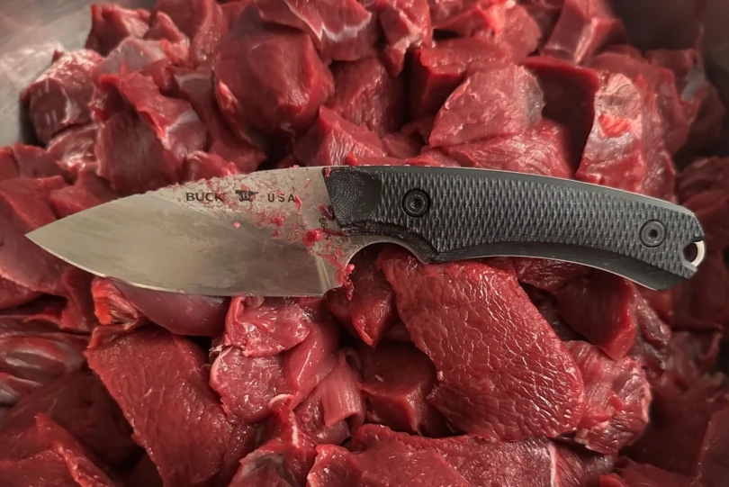 Alpha Hunter Elite Knife in venison meat