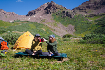 the author sits on the lowdown cot in colorado