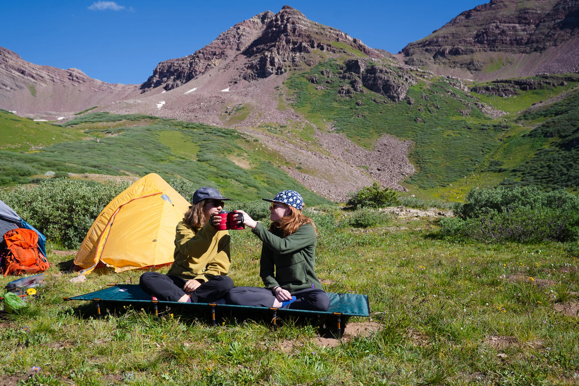 the author sits on the lowdown cot in colorado