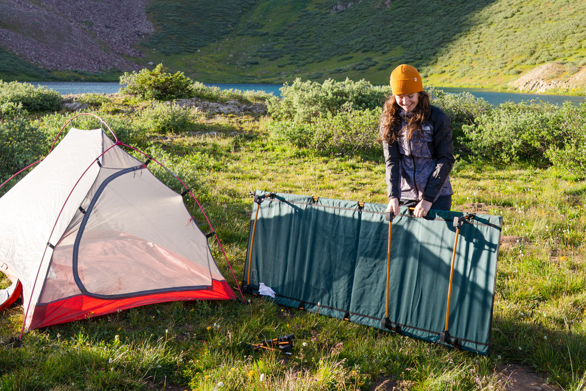 the author setting up the kelty lowdown cot in colorado this summer