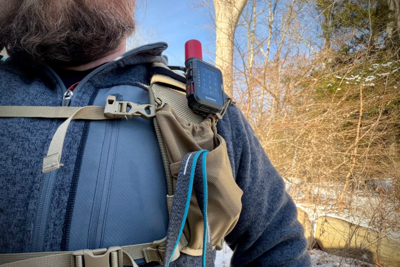 Chest strap area of the Mountainsmith Mayhem EVO 30L Backpack with a GPS device attached