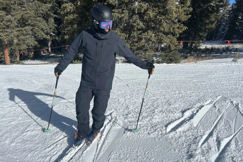 Full-body view showing the Norrona Lofoten jacket paired with Flex1 pants