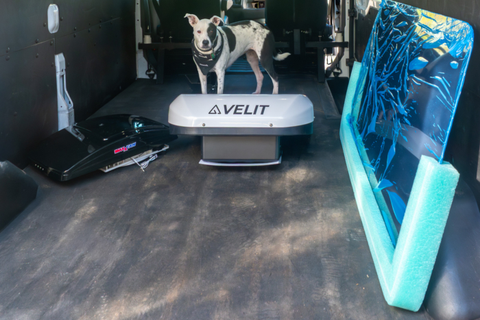 Inside of van with campervan parts ready to install