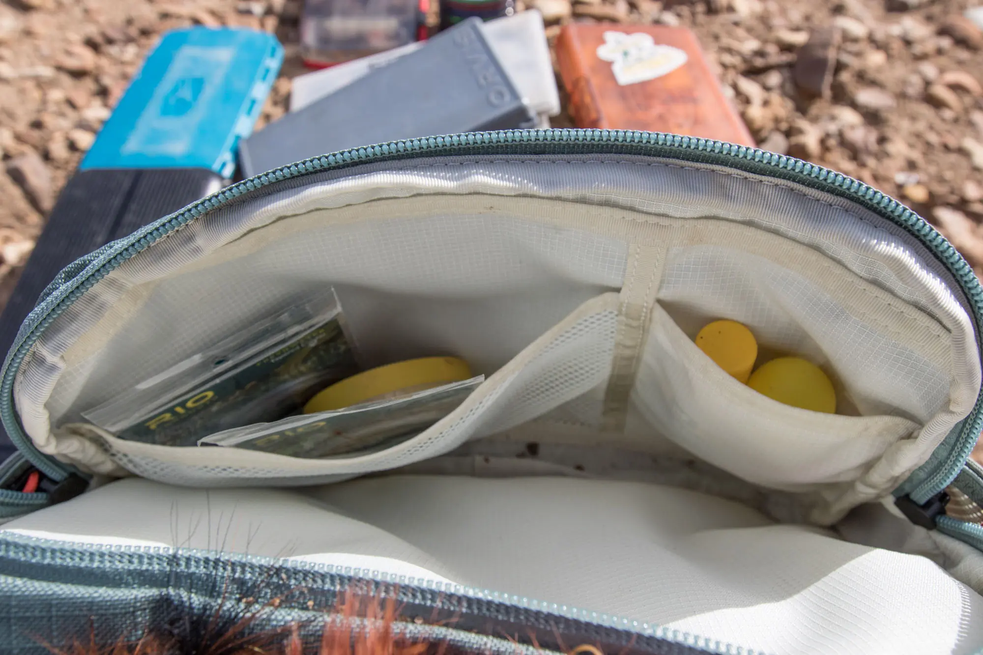 The Umpqua Northfork Chest Pack fishing pack showing interior pockets.