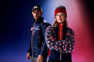 Man and woman stand in USA Olympic apparel