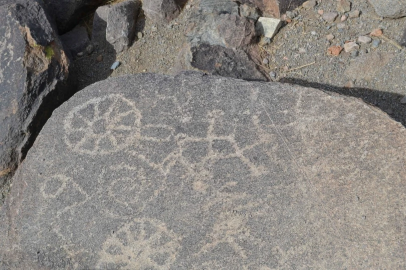 petroglyphs carved into rock