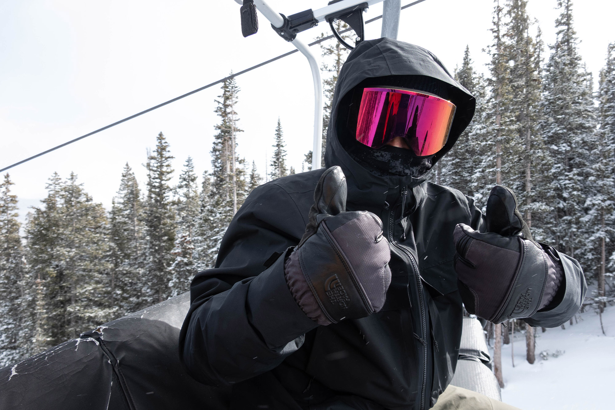 Giving a thumbs-up in the First Chair jacket on a cold lift ride