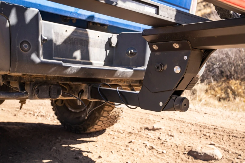 The rack’s hitch connection and wiring are shown in detail