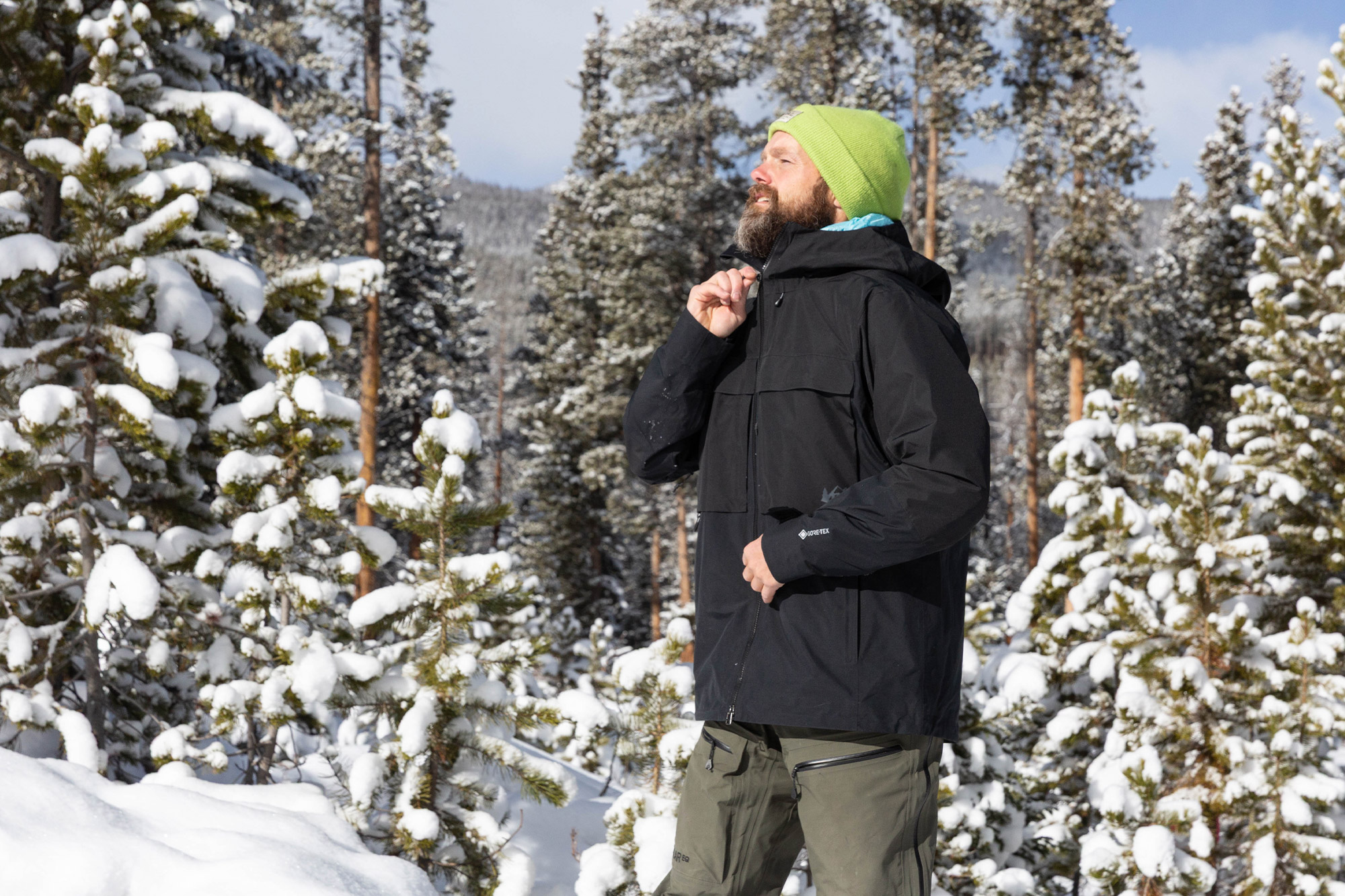 Zipping the REI ski coat while warming up in the sun