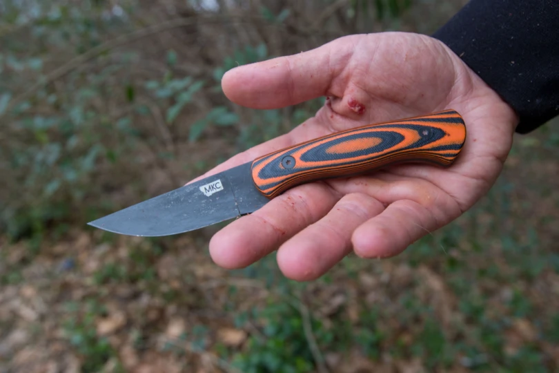 The Montana Knife Company 2.0 in the palm of a hand.