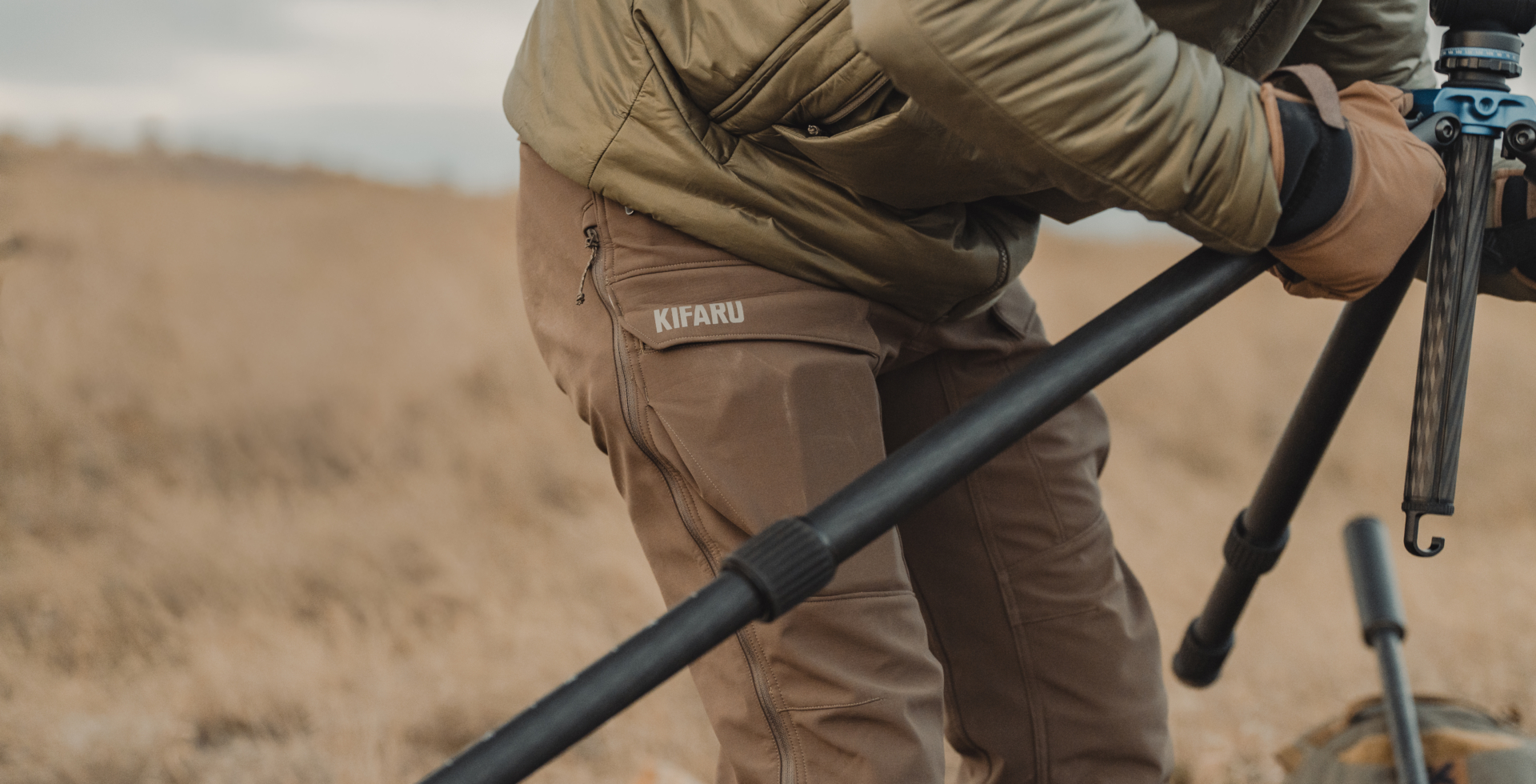 The new Kifaru Torlander pants on a hunter as he takes down a tripod.