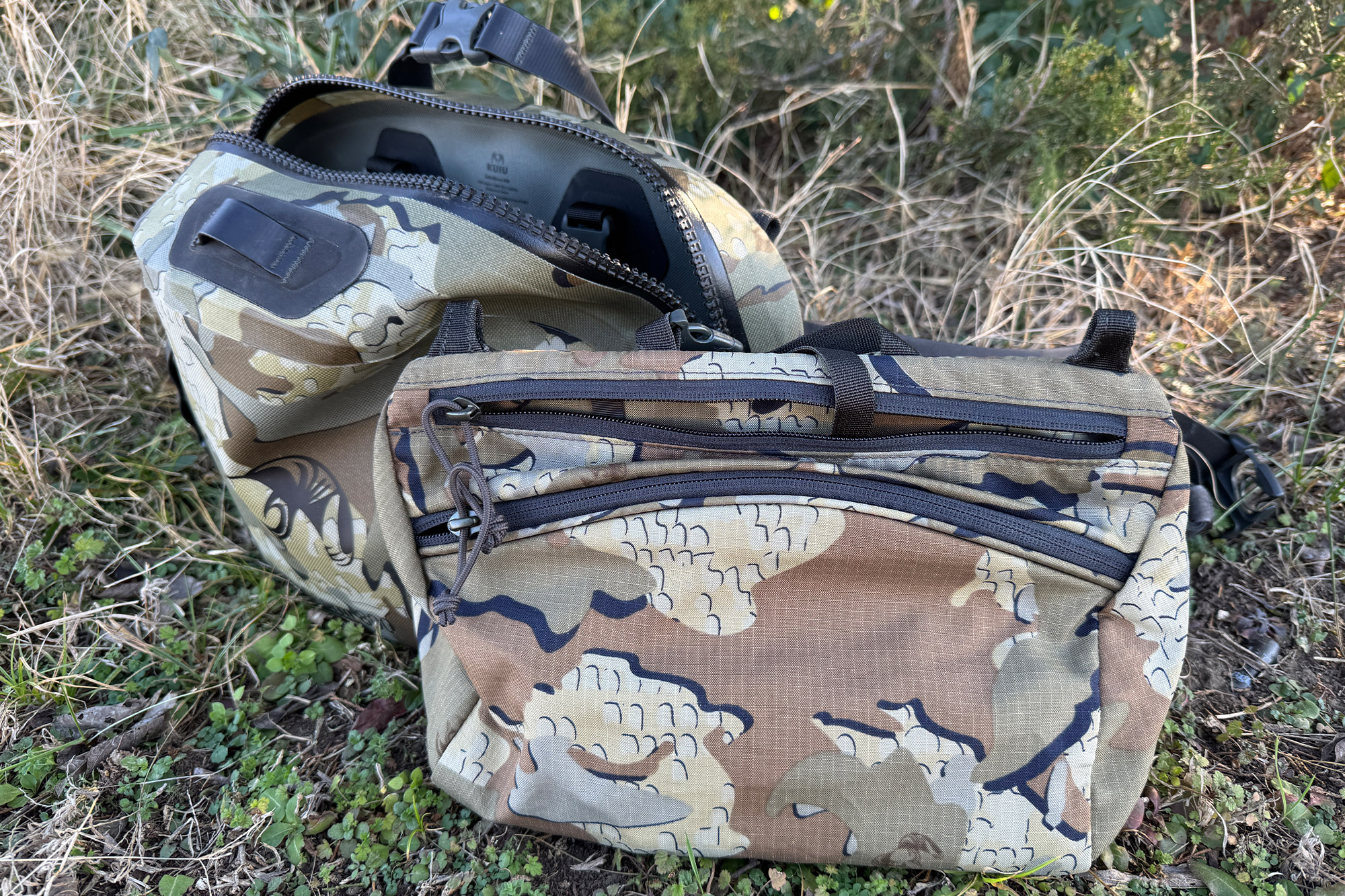Open DeltaStorm waistpack showing main compartment and front zip pocket