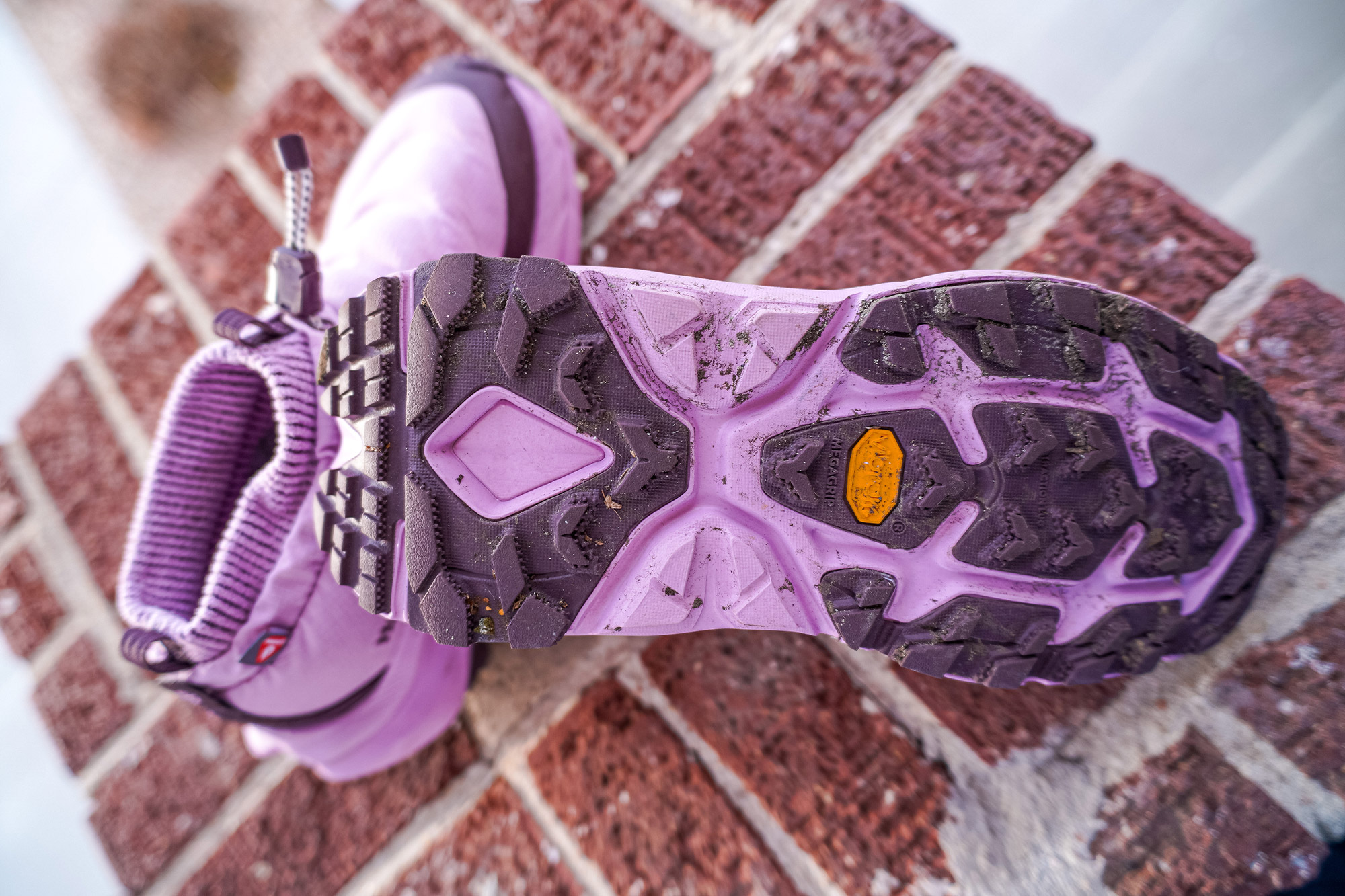 The frost moc outsole shows the Vibram tread with light dirt from use