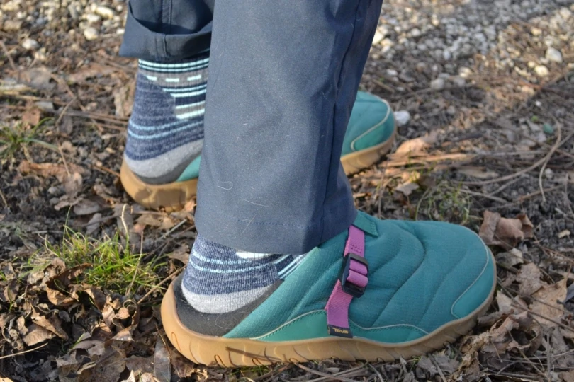 person wearing outdoor slipper