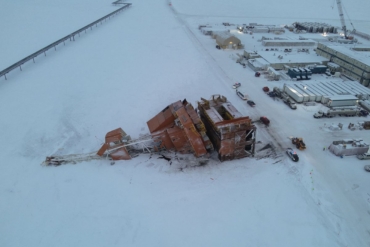 oil rig toppled over on snow