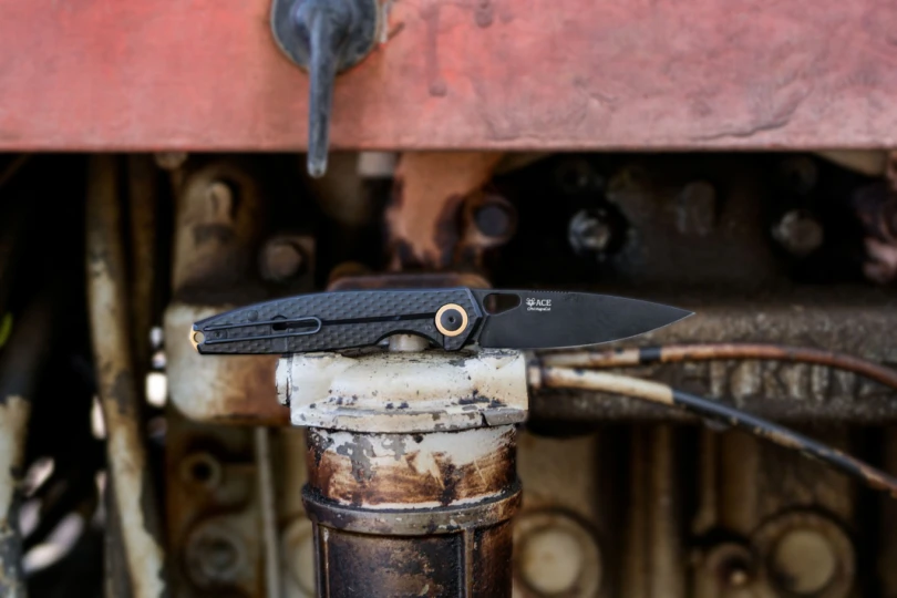 knife in front of heavy machinery