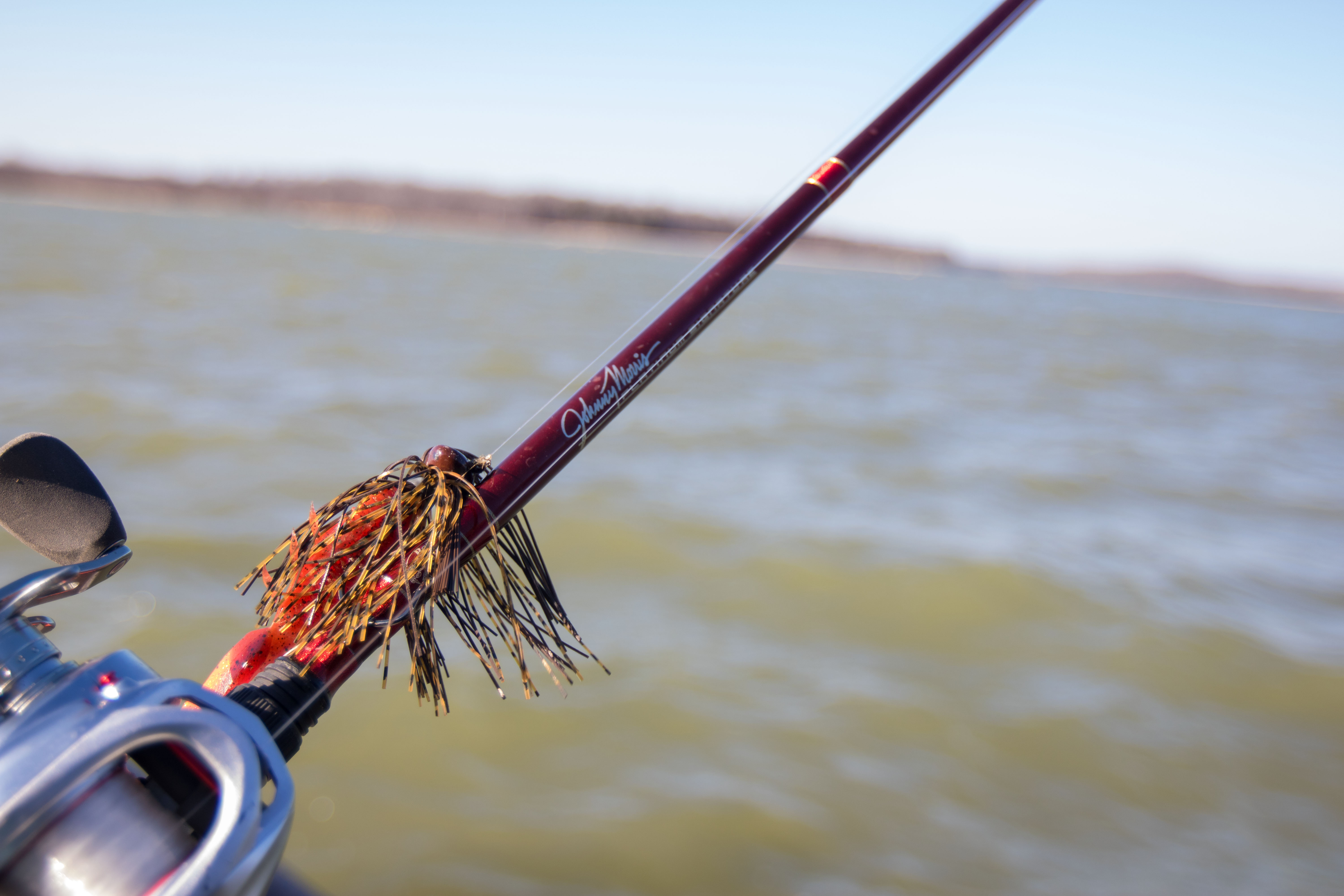 A jig attached to a bass fishing rod.