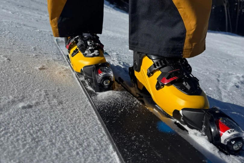 La Sportiva Sender ski boots are clicked into alpine bindings on firm, icy snow