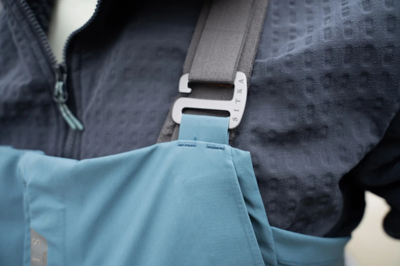 The hook and loop strap on the SITKA Cat 5 bib