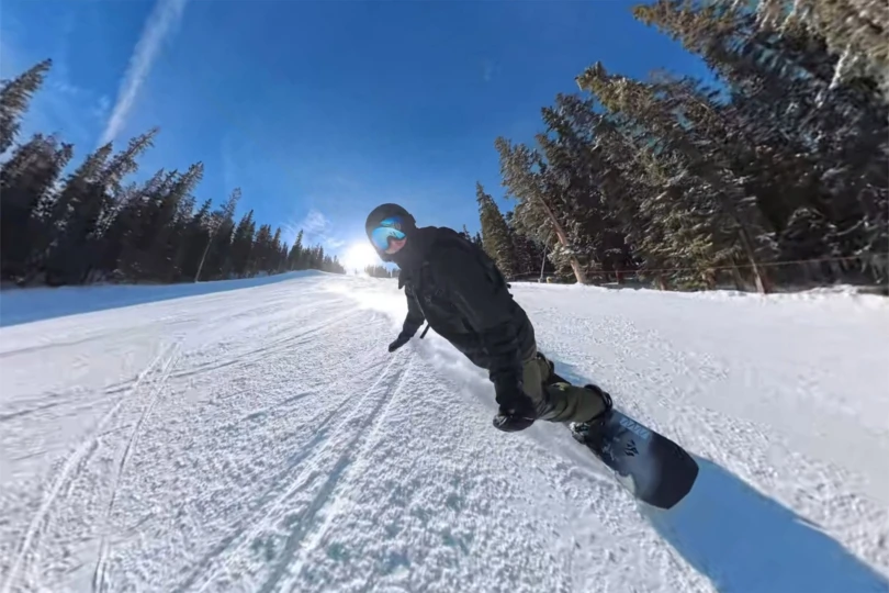 The Supermatic holds firm through a toe-side turn on packed snow